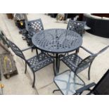 A CAST METAL GARDEN BISTRO SET WITH ROUND TABLE AND FOUR CHAIRS