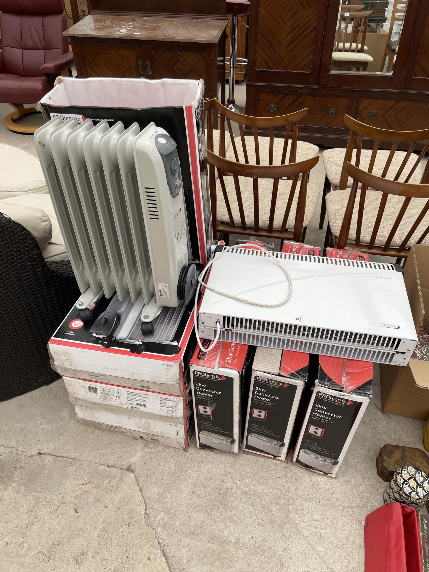 A GROUP OF SEVEN ELECTRIC HEATERS