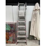 A FIVE RUNG ALLUMINIUM STEP LADDER AND TWO THREE WAY COMBINATION LADDERS