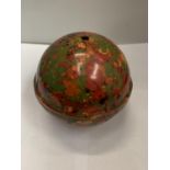 A VINTAGE MULTI COLOURED BAKELITE WOOL BALL