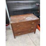 AN OAK CHEST OF THREE DRAWERS