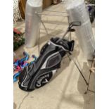 A CALLAWAY GOLF BAG WITH EIGHT VARIOUS GOLF CLUBS