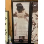 A LARGE BLACK FRAMED ORIGINAL KODAK PRINT OF A 1940'S LADY IN A POLKA DOT DRESS AND SEAMED STOCKINGS