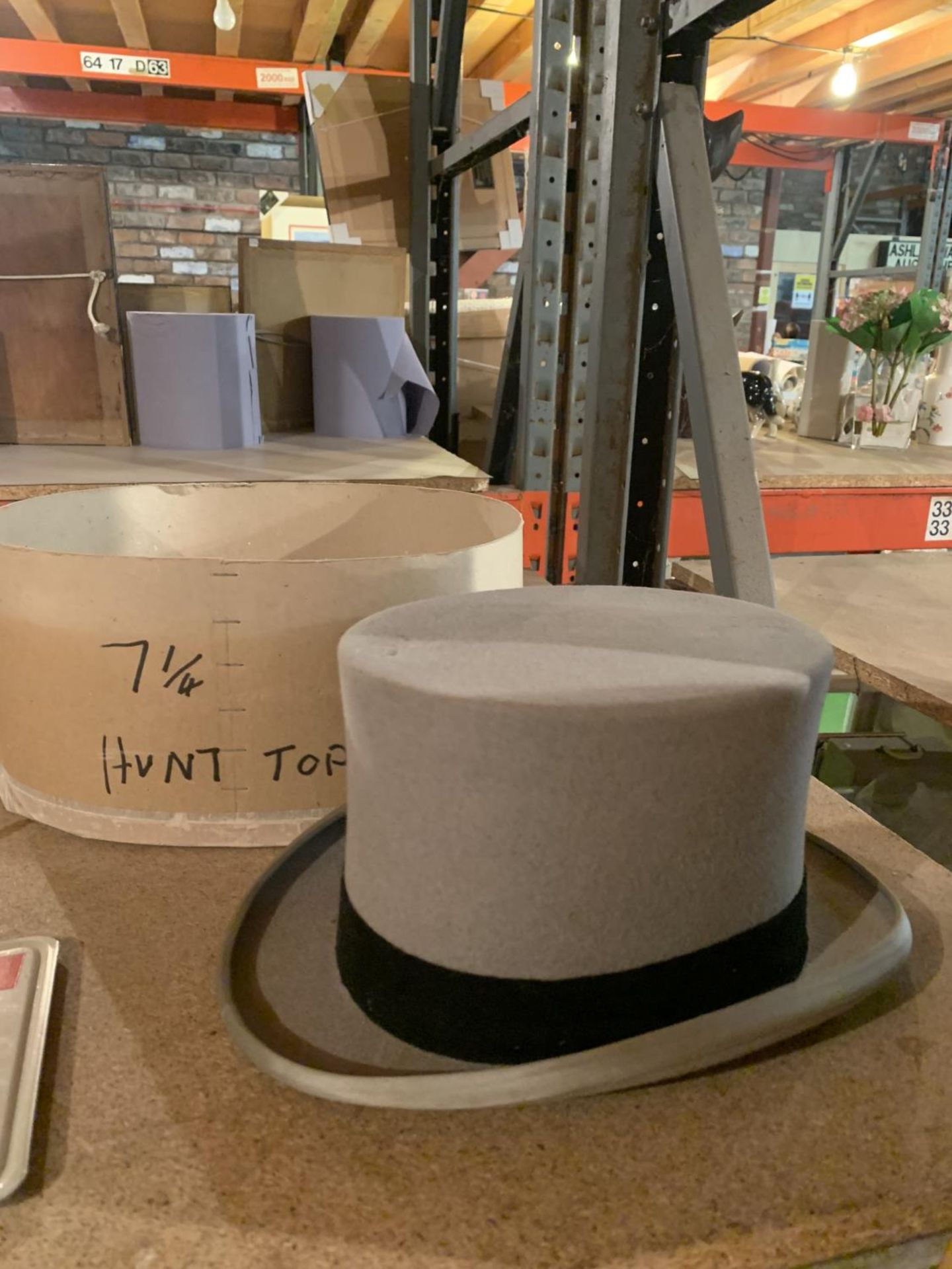 A GREY MOSS BROS TOP HAT SIZE 7 1/4