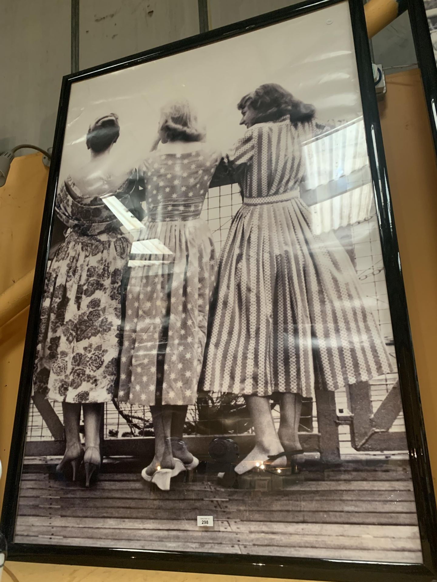 A VERY LARGE KODAK BLACK AND WHITE FRAMED 1940'S/1950'S PRINT OF THREE LADIES ON A PIER 156CM X