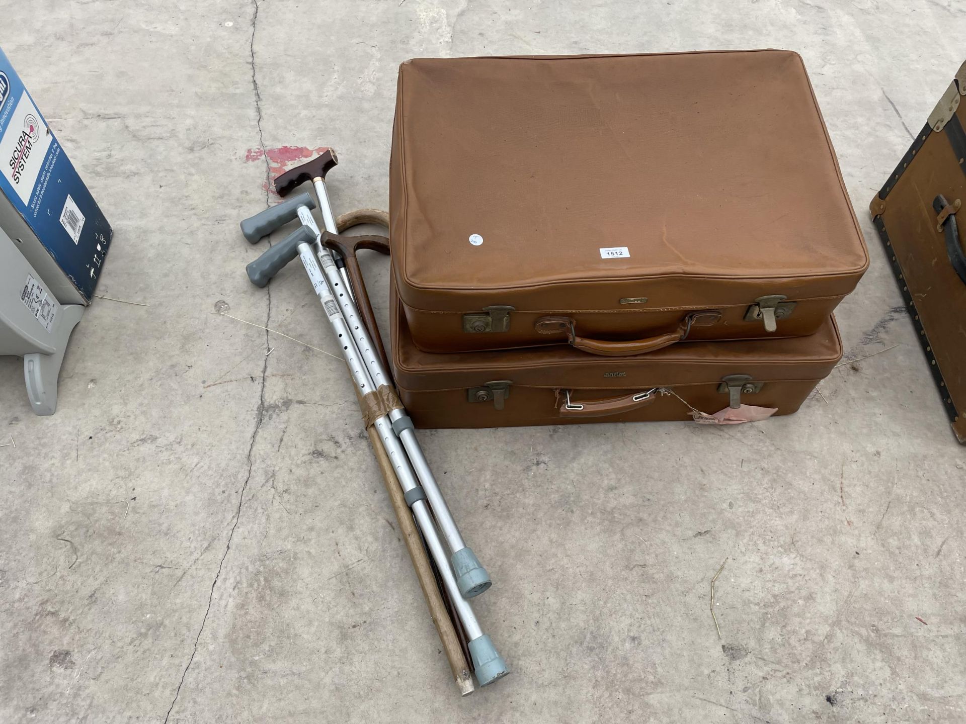 TWO VINTAGE SUITCASE AND VARIOUS WALKING STICKS