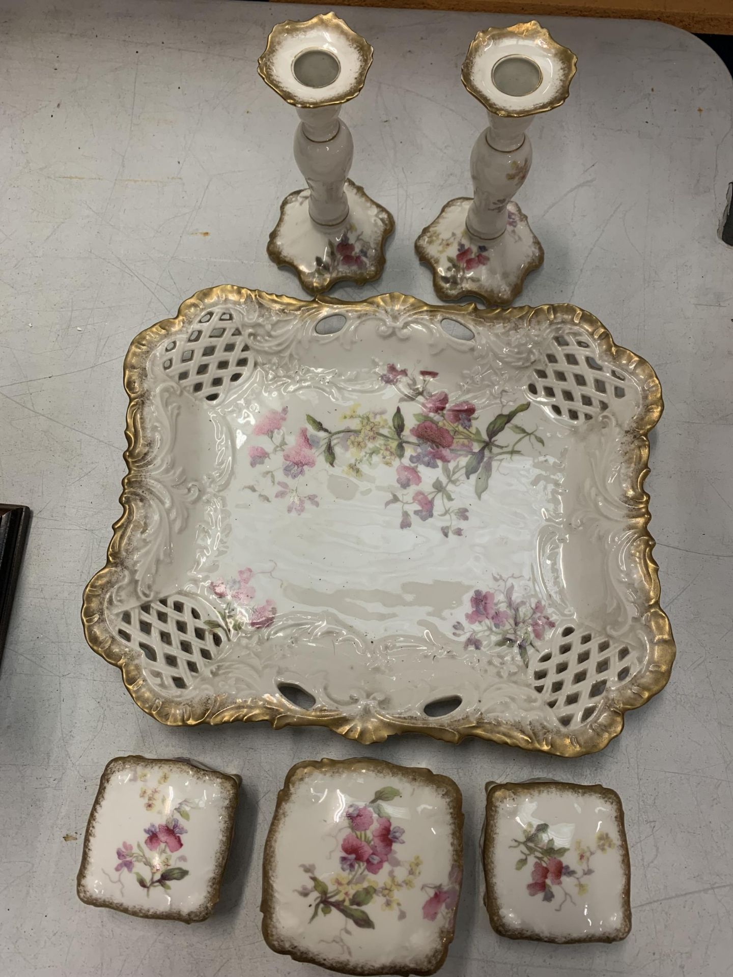 A LIMOGES FRANCE 'A.LANTERNIER' DRESSING TABLE SET COMPRISING TRAY, THREE LIDDED TRINKET DISHES
