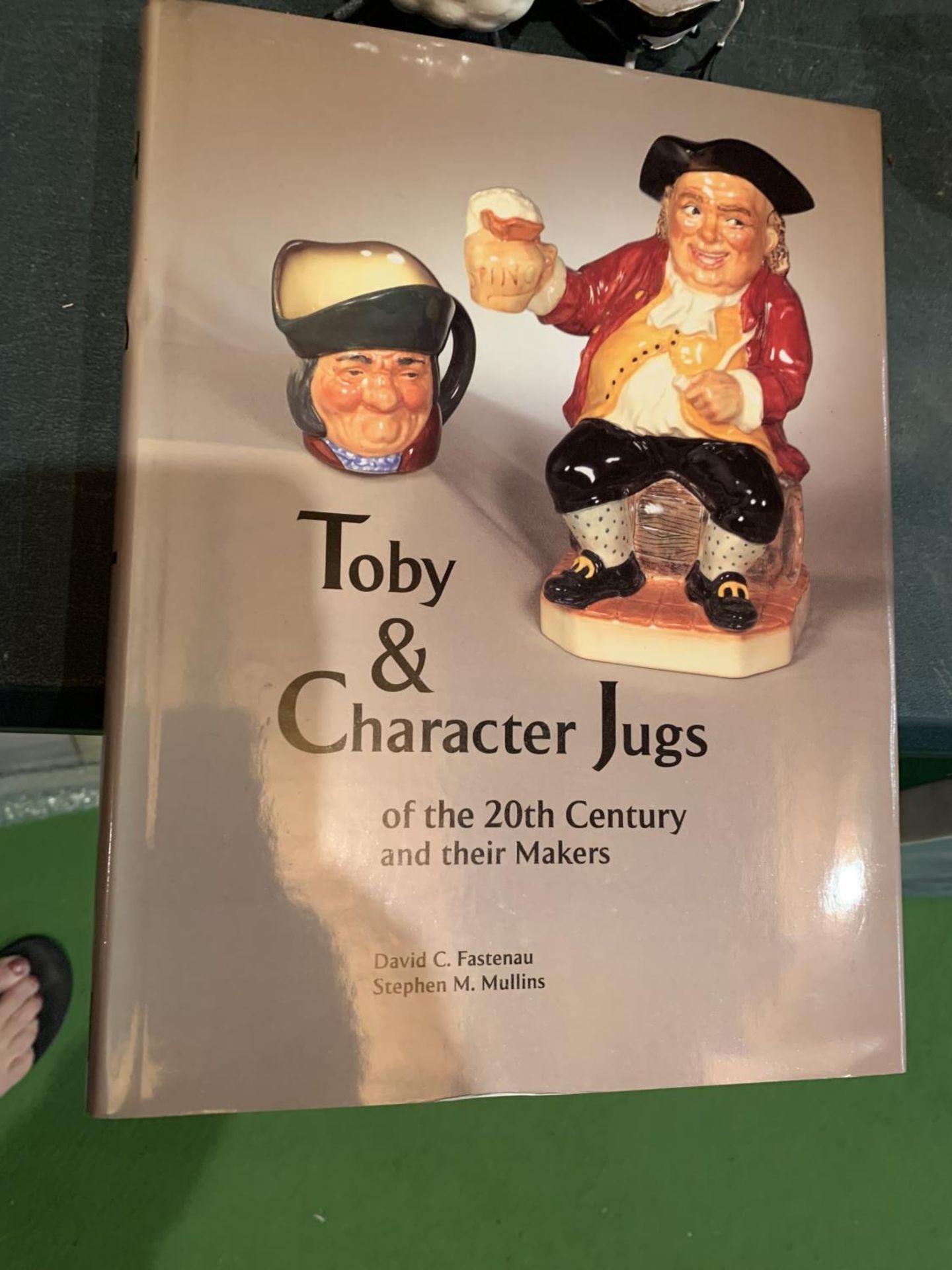 A BOOKK ENTITLED TOBY AND CHARACTER JUGS OF THE 20TH CENTURY AND THEIR MAKERS