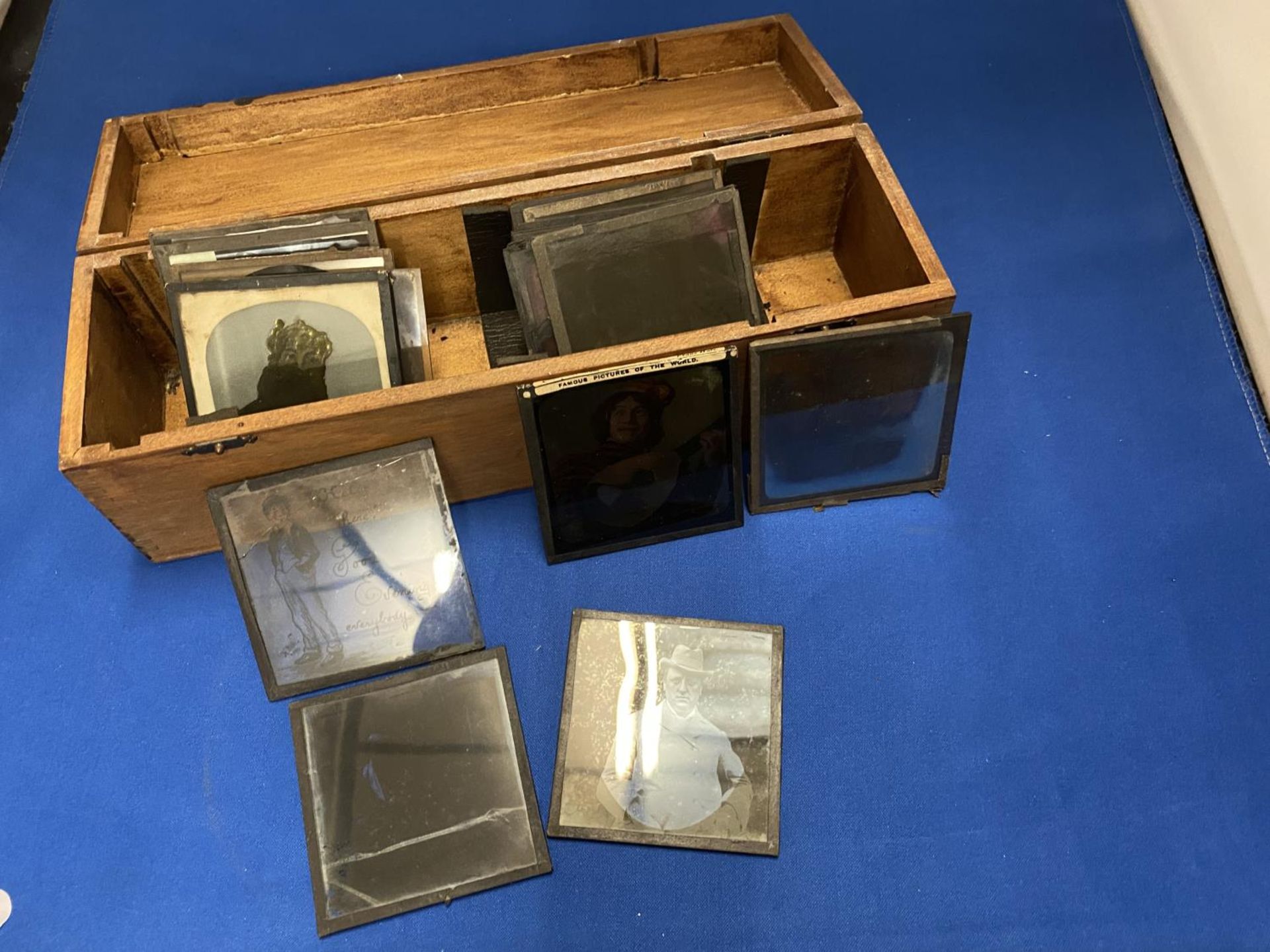 A COLLECTION OF GLASS SLIDES SOME BEING COLOUR IN WOODEN BOX
