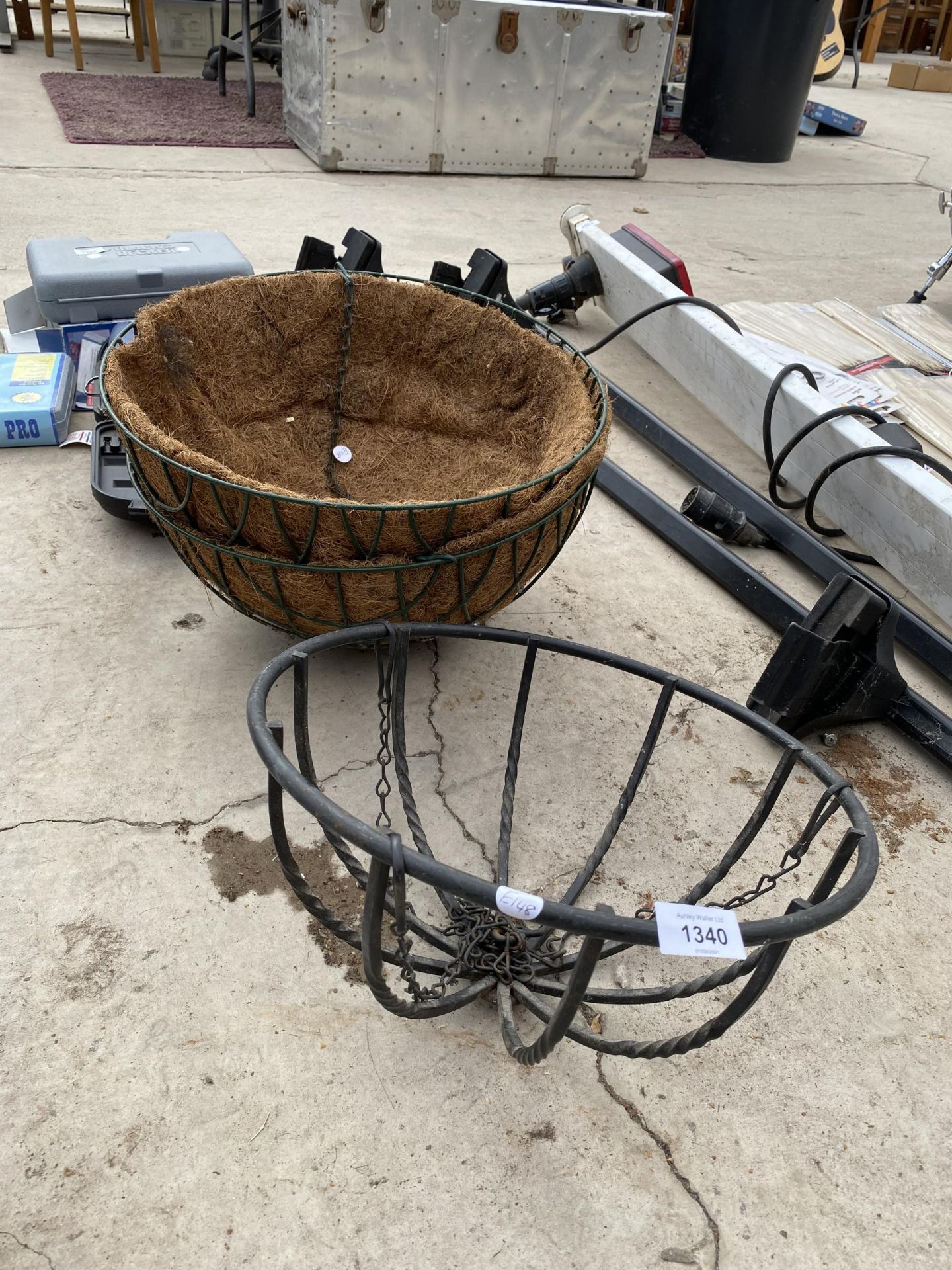 A GROUP OF THREE WIRE HANGING BASKETS