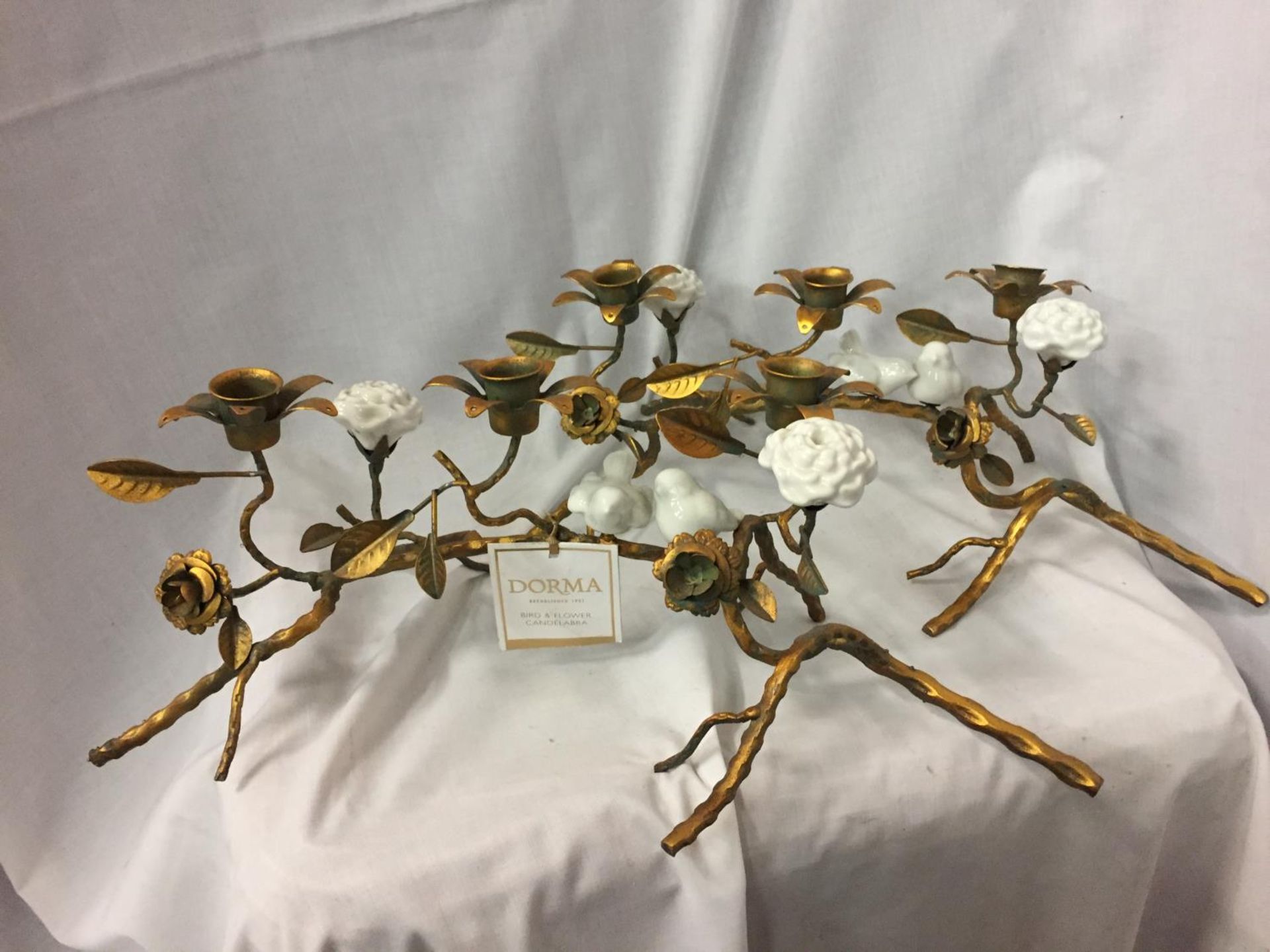 TWO DORMA BIRD AND FLOWER THREE ARM CANDELABRE