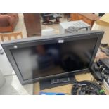 A 32" SONY BRAVIA TELEVISON WITH REMOTE CONTROL