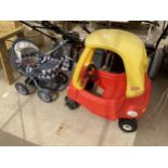 A LITTLE TYKES COZY COUPE CAR AND A DOLLS PRAM WITH DOLL