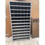 A VINTAGE METAL 60 SECTION PIGEON HOLE STORAGE UNIT