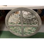 A VINTAGE STYLE DECORATIVE CIRCULAR MIRROR