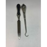 TWO SILVER HANDLED ITEMS TO INCLUDE A FILE AND A BOOT HOOK