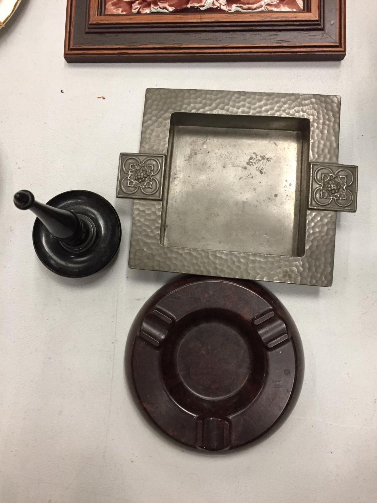 TWO ASH TRAYS AND A RING HOLDER, ONE ASH TRAY IS PEWTER