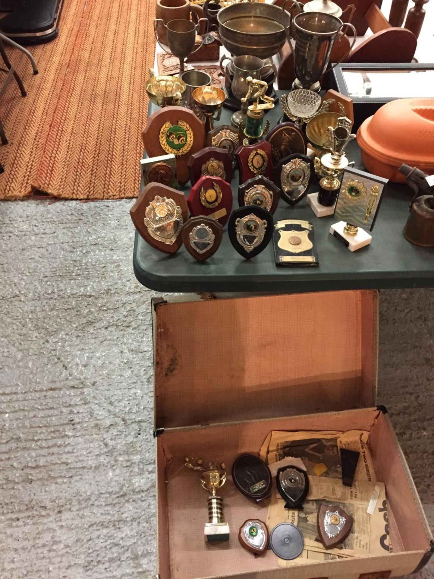 A SUITCASE OF VARIOUS SPORTING TROPHIES