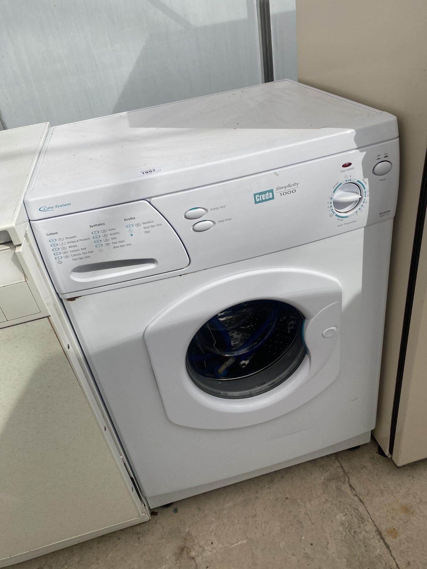 A WHITE CREDA WASHING MACHINE BELIEVED IN GOOD WORKING ORDER BUT NO WARRANTY GIVEN