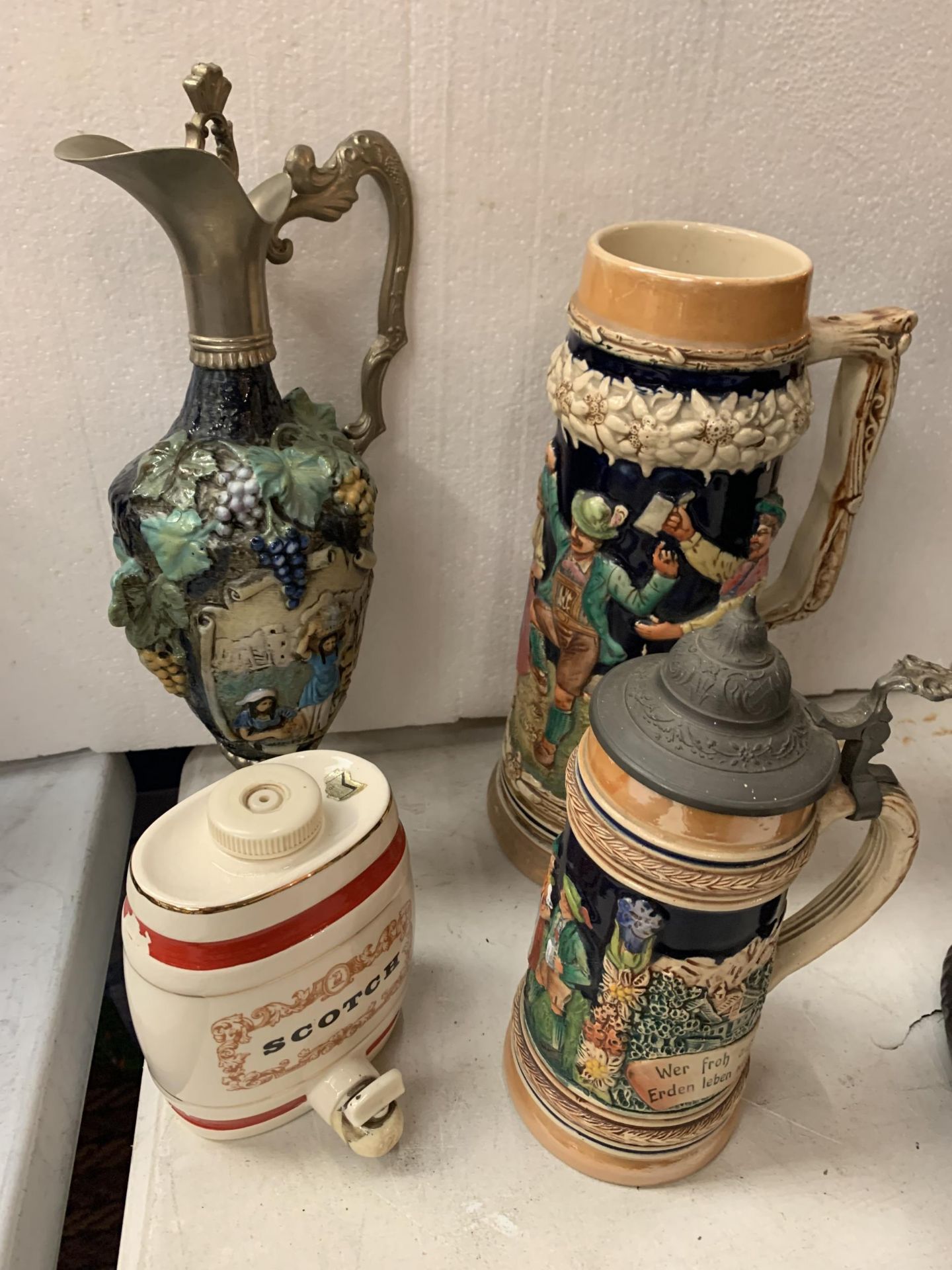 A COLLECTION OF FOUR 'DRINKS' CERAMICS TO INCLUDE A STEIN DRINKING VESSEL, A ROYAL VICTORIA WADE
