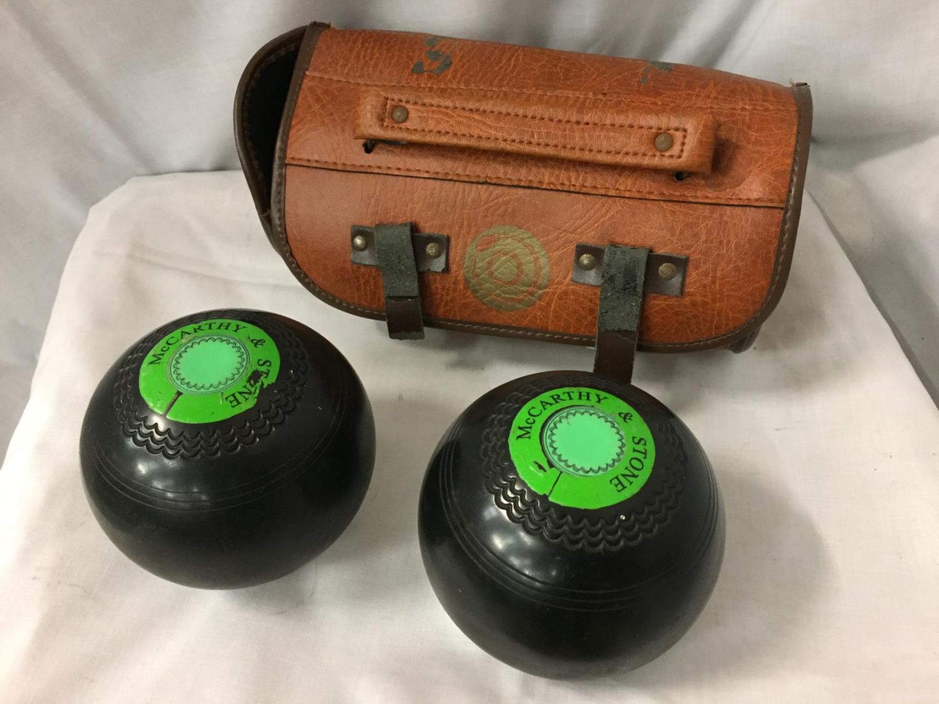 A PAIR OF TAYLOR TRIPLE CROWN BOWLS IN CARRYING CASE