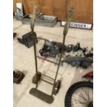 A VINTAGE TWO WHEELED METAL SACK TRUCK WITH WOODEN HANDLES