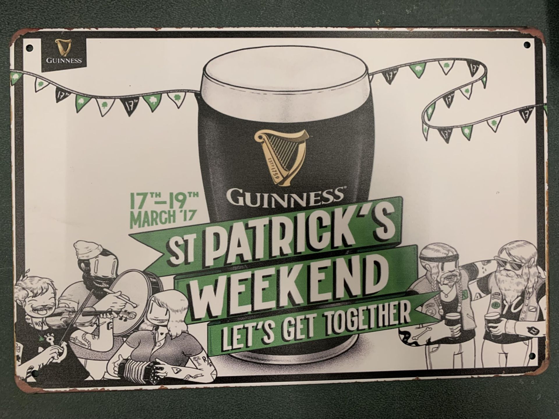 A VINTAGE STYLE METAL ST PATRICKS DAY GUINNESS SIGN