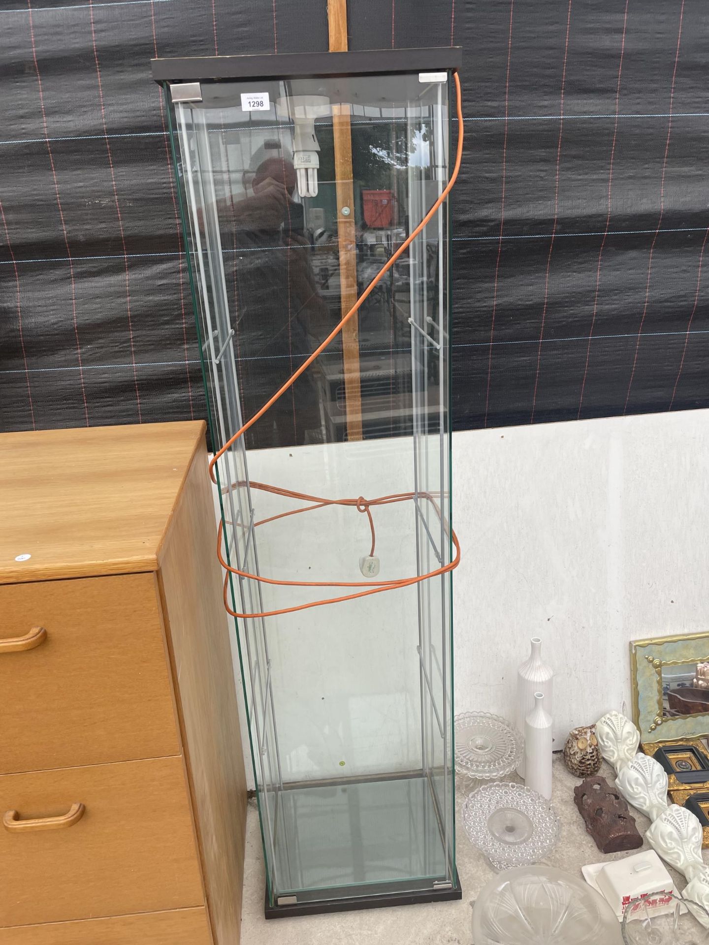 A GLASS LIGHT UP SHOP DISPLAY CABINET