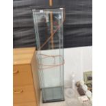 A GLASS LIGHT UP SHOP DISPLAY CABINET