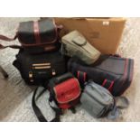 A SELECTION OF SIX CAMERA CASES OF VARIOUS SIZES {CAMERAS NOT INCLUDED}