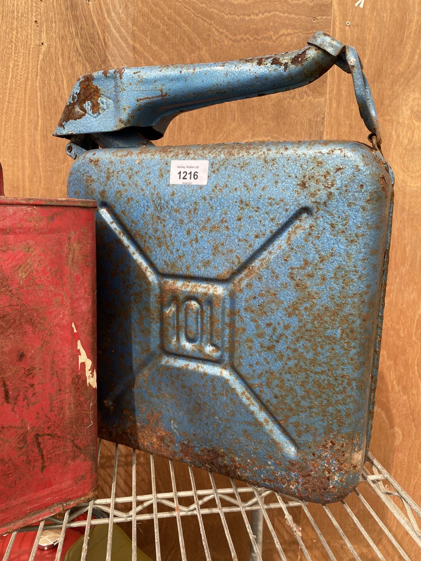 A VINTAGE RED FUEL CAN WITH BRASS TOP AND A FURTHER BLUE FUEL CAN - Image 3 of 4