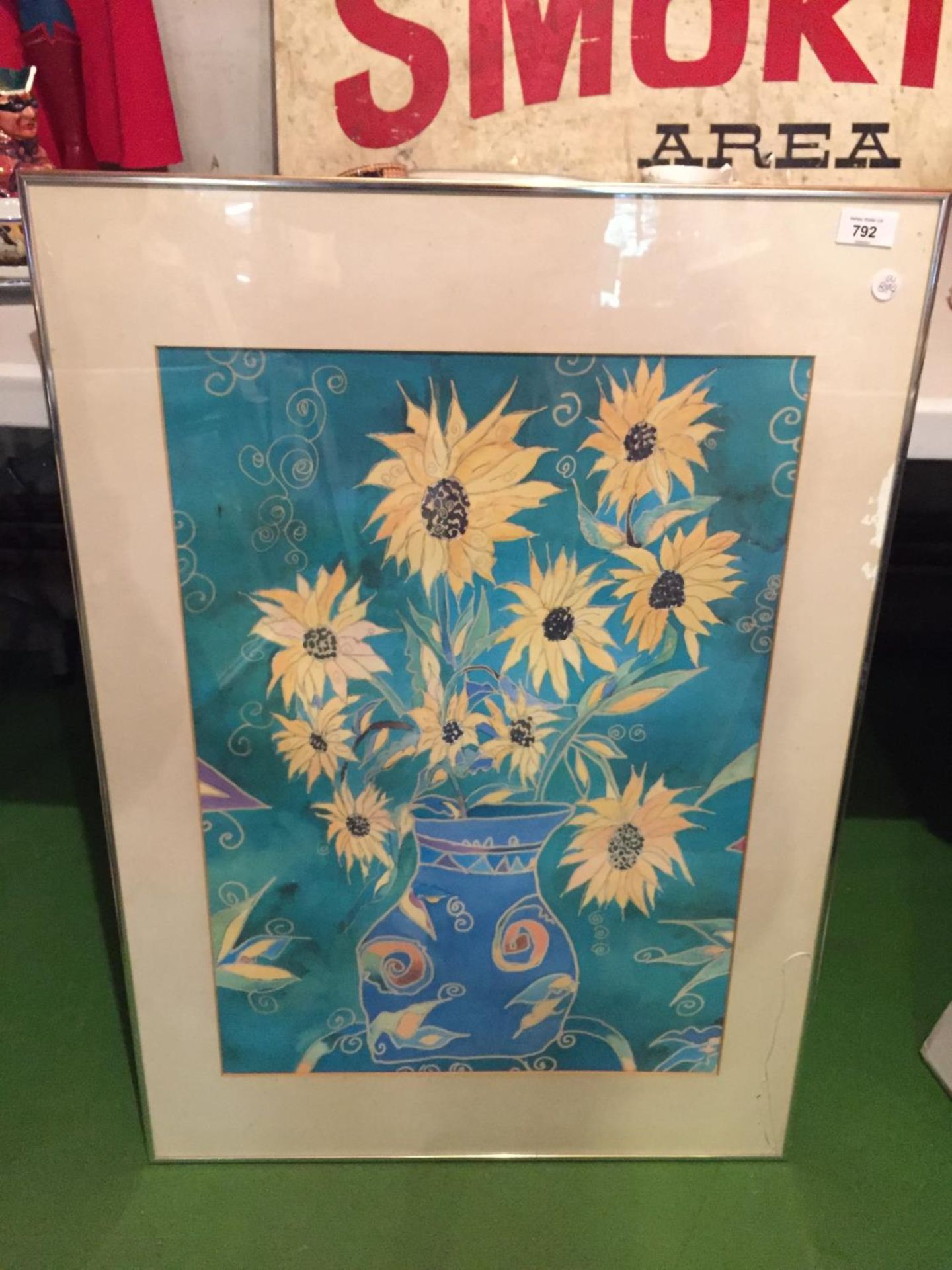 A LARGE FRAMED PRINT OF SUNFLOWERS IN A VASE
