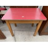 A 1950'S FORMICA TOP TABLE 35"X22.5"