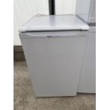 A WHITE HOTPOINT FIRST EDITION UNDERCOUNTER FRIDGE