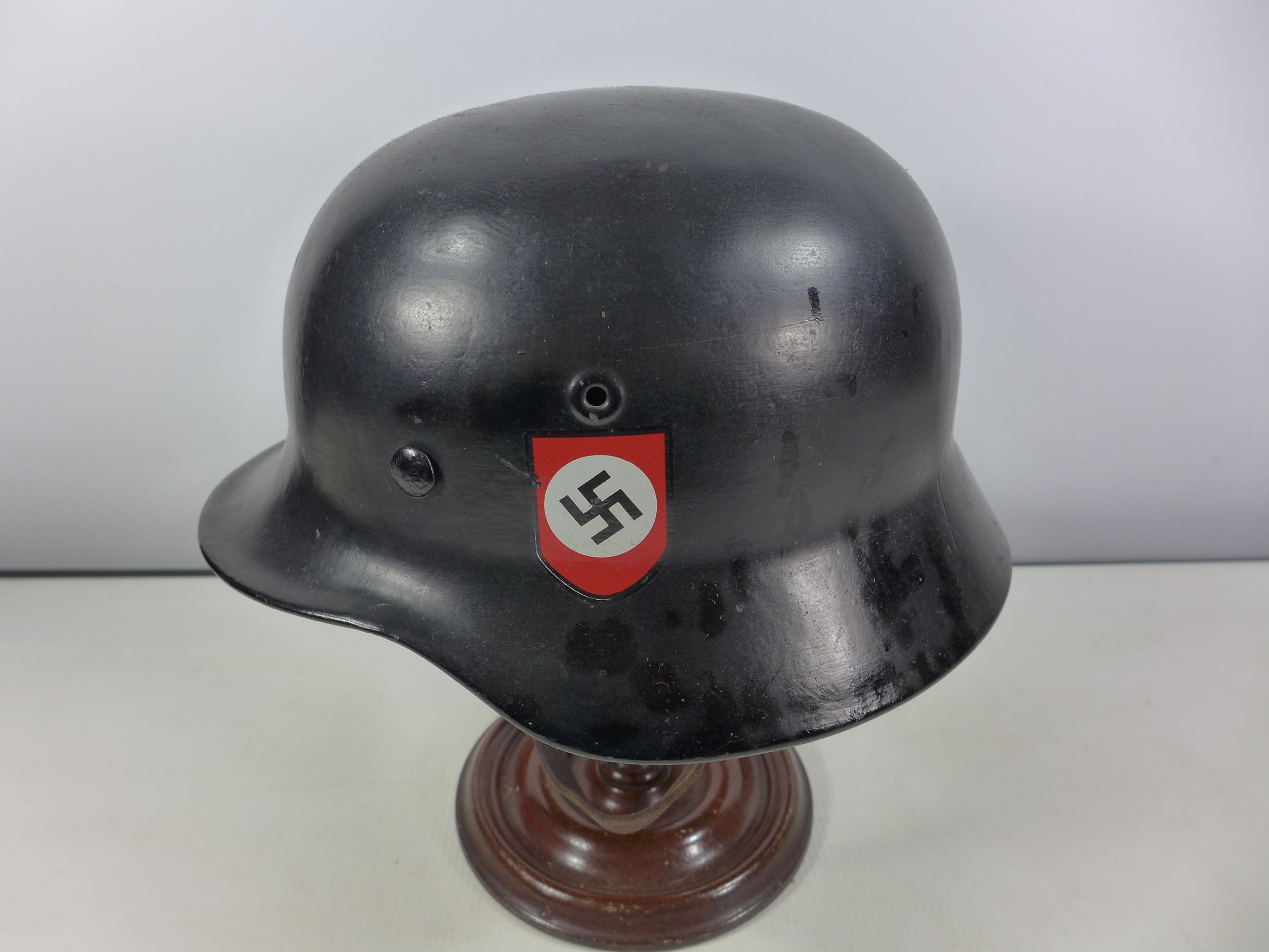 A GERMAN BLACK PAINTED METAL HELMET WITH SS RUNES AND SWASTIKA DECALS - Image 2 of 8