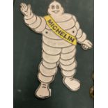 A CAST MICHELIN MAN SIGN