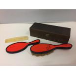 A VINTAGE BOXED BRUSH, MIRROR AND COMB SET