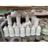 A LARGE QUANTITY OF INDUSTRIAL SEWING MACHINE BOBBINS WITH COTTON