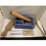 A VINTAGE WOODEN PAINTED WORK BOX WITH BUTTER PATS, ROLLING PIN AND LADEL ALONG WITH THREE METAL