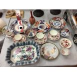 A LARGE COLLECTION OF ORIENTAL STYLE CHINA TO INCLUDE CUPS SAUCERS AND PLATES ETC