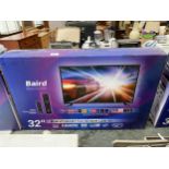 A BAIRD 32" TELEVISION WITHE STAND AND REMOTE CONTROL