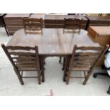 AN EARLY 20TH CENTURY OAK GATE LEG DINING TABLE 58" X 35" OPEN AND FOUR LANCASHIRE STYLE LADDER BACK