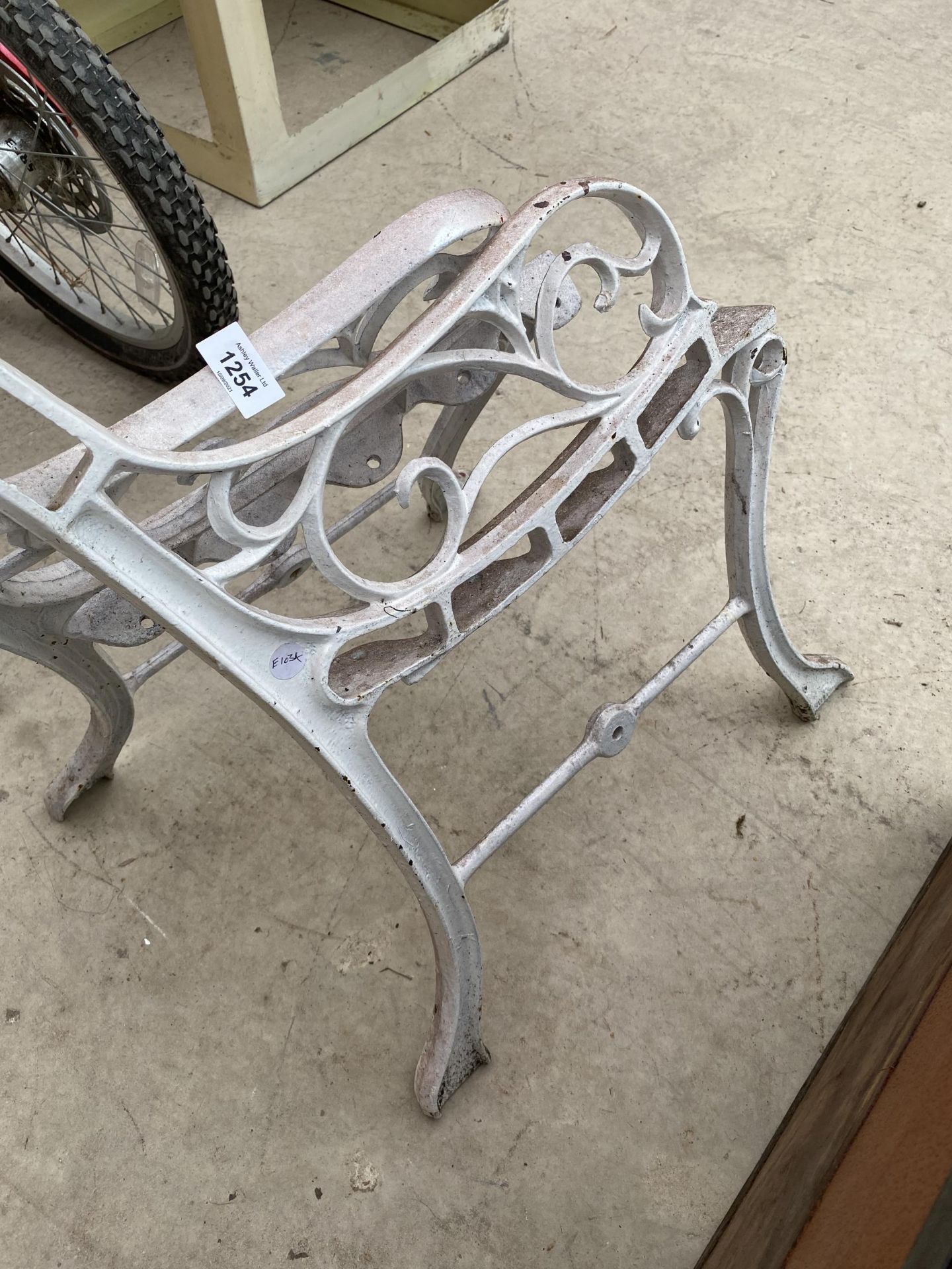 A PAIR OF WHITE PAINTED CAST IRON BENCH ENDS - Image 2 of 4
