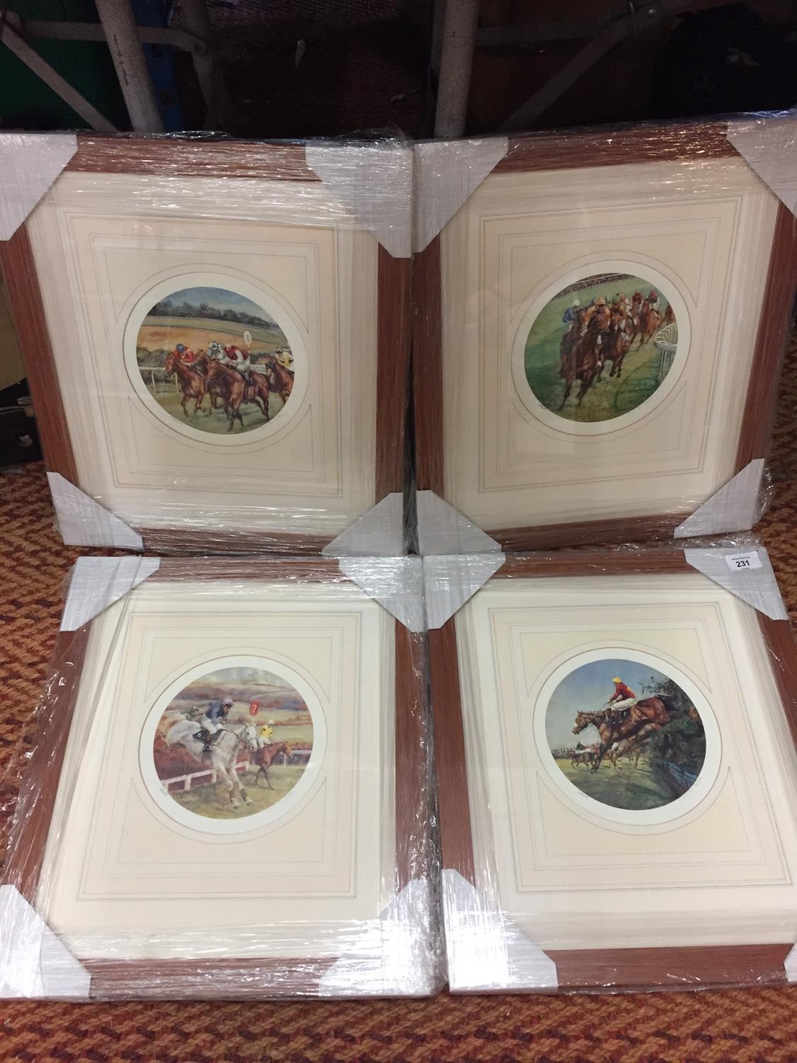 A SET OF FOUR FRAMED LIMITED EDITION PRINTS OF RACING SCENES BY CLAIRE EVA BURTON