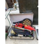 A VINTAGE TRAVEL TRUNK WITH AN ASSORTMENT OF SPORTS EQUIPMENT TO INCLUDE DART BOARD, TENNIS