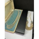 TWO PEARL NECKLACES WITH PRESENTATION BOXES