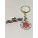 A DINKY TOYS KEY RING AND PIN BADGE