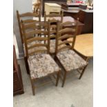 A SET OF FOUR MODERN LADDER-BACK DINING CHAIRS BY NEW PLAN FURNITURE