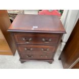 A MAHOGANY AND INLAID CHEST OF THREE DRAWERS 19" WIDE