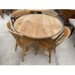 A 42" DIAMETER VICTORIAN STYLE PINE TRIPOD DINING TABLE AND FOUR CHAIRS